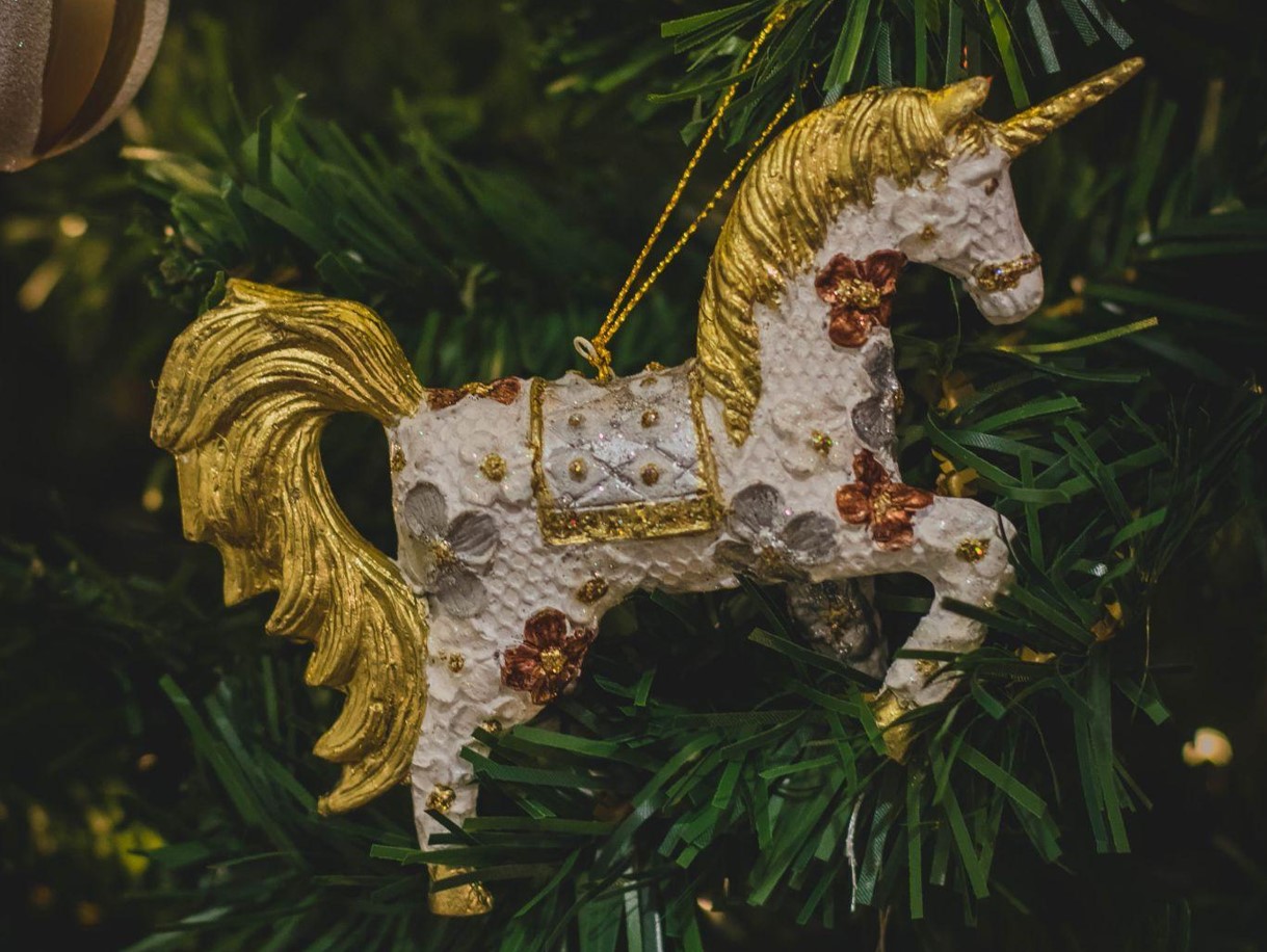 The Beauty of Flocked Christmas Trees & Star Toppers